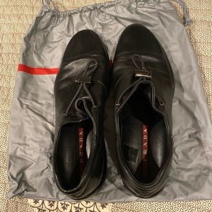 Prada Linea Rossa leather slip-ons